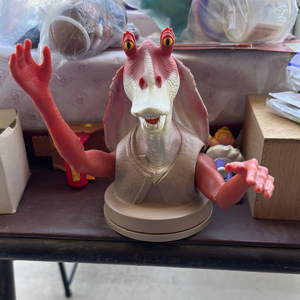Reptile Figure with Red and Tan Colors